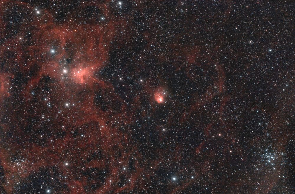 Die Spinne (IC 417) und die Fliege (NGC 1931)